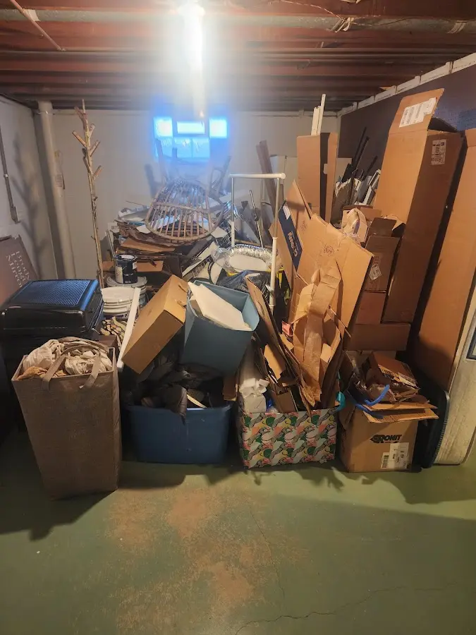 Roll-off dumpster container at job site for Yard Waste Dumpster Rental in Schodack